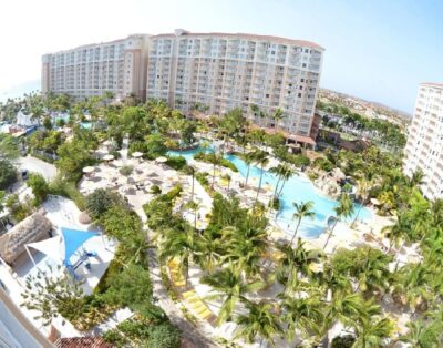 Modern 1BR Condo | Balcony, Pool, Kitchen – Aruba Surf Club